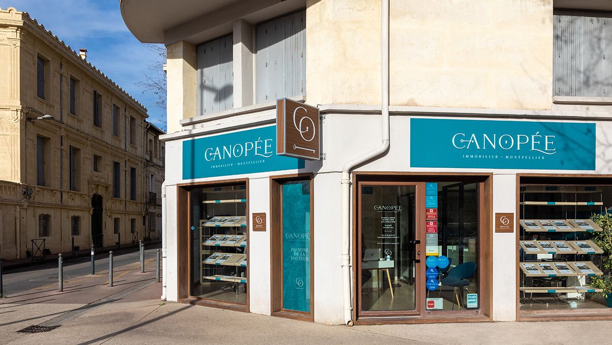 pose enseigne agence immobilier montpellier